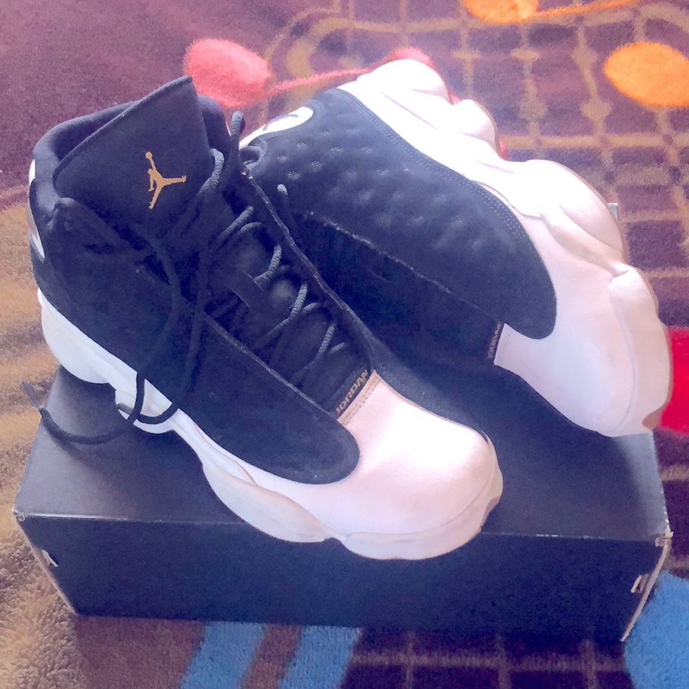 Suede Black and White with tan bottom Jordan 13’s